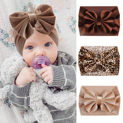 YanJie soft velvet headband with leopard bow, comfortable fit for newborns