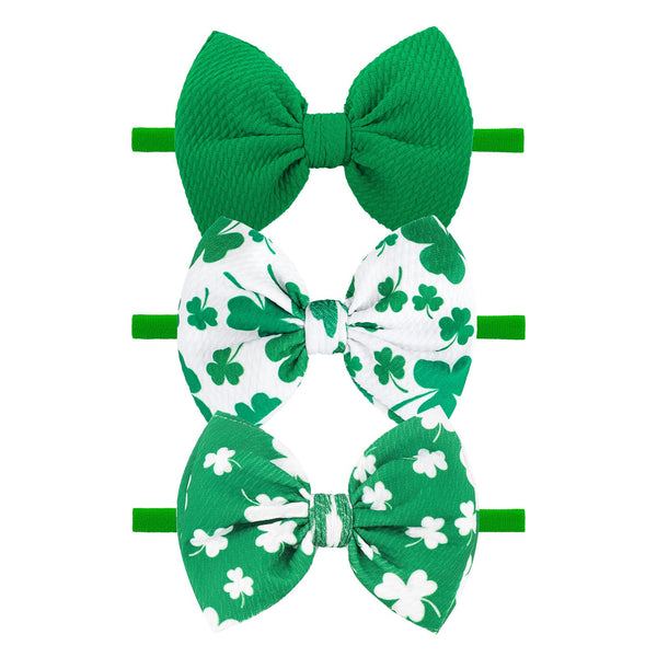 YanJie St Patrick headband with clover for festive photos.