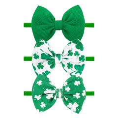 YanJie St Patrick headband with clover for festive photos.