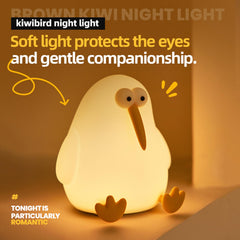 YEEFIGRO squishy kiwibird lamp sits gently on a nightstand.