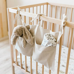 YeeMan bedside storage two-pocket close-up showing natural linen and sturdy strap