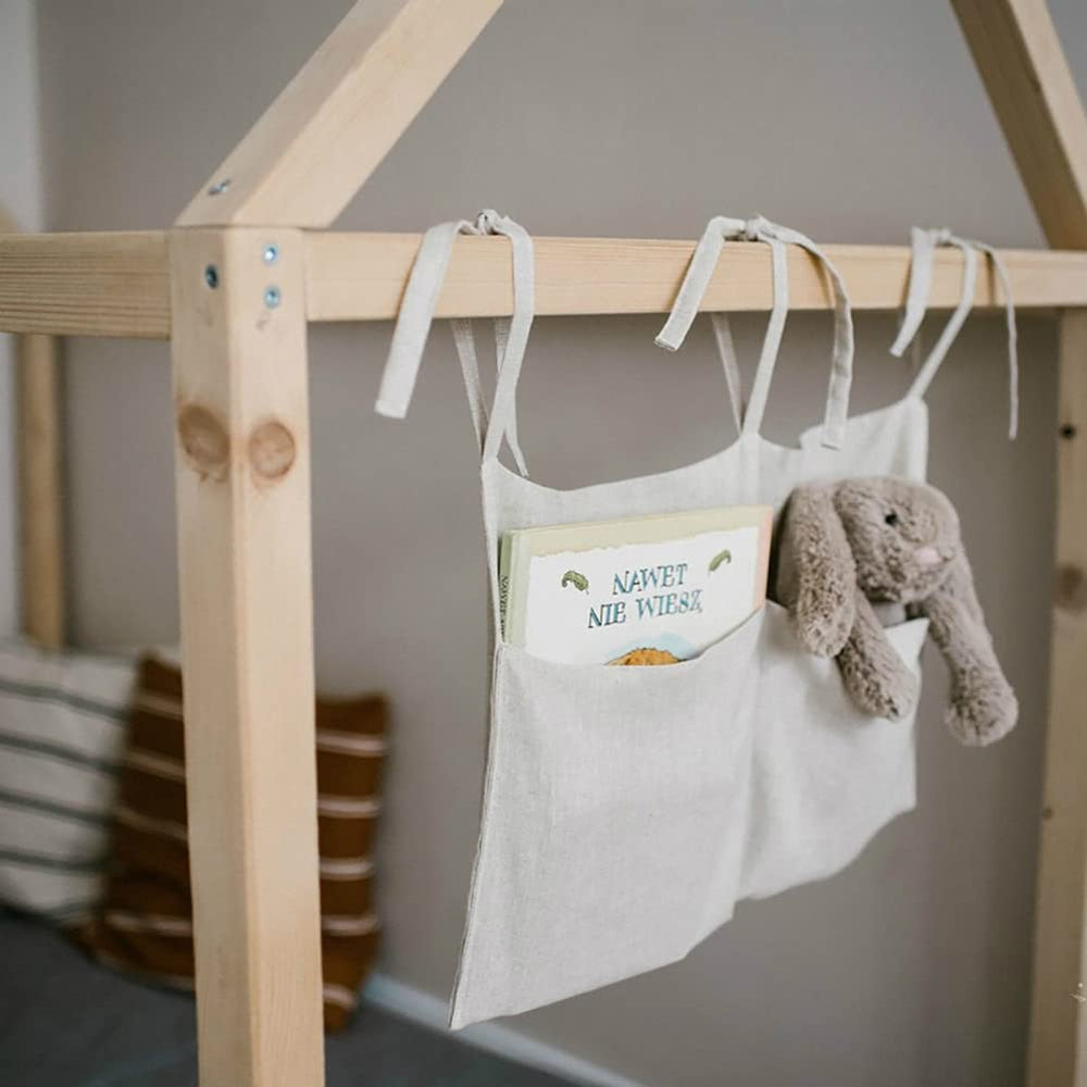 YeeMan crib organizer with adjustable straps ready to hang beside the crib