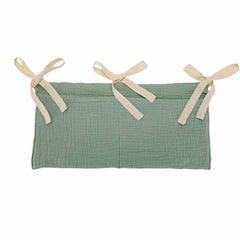 YeeMan two-pocket crib organizer hanging setup for toys and books.