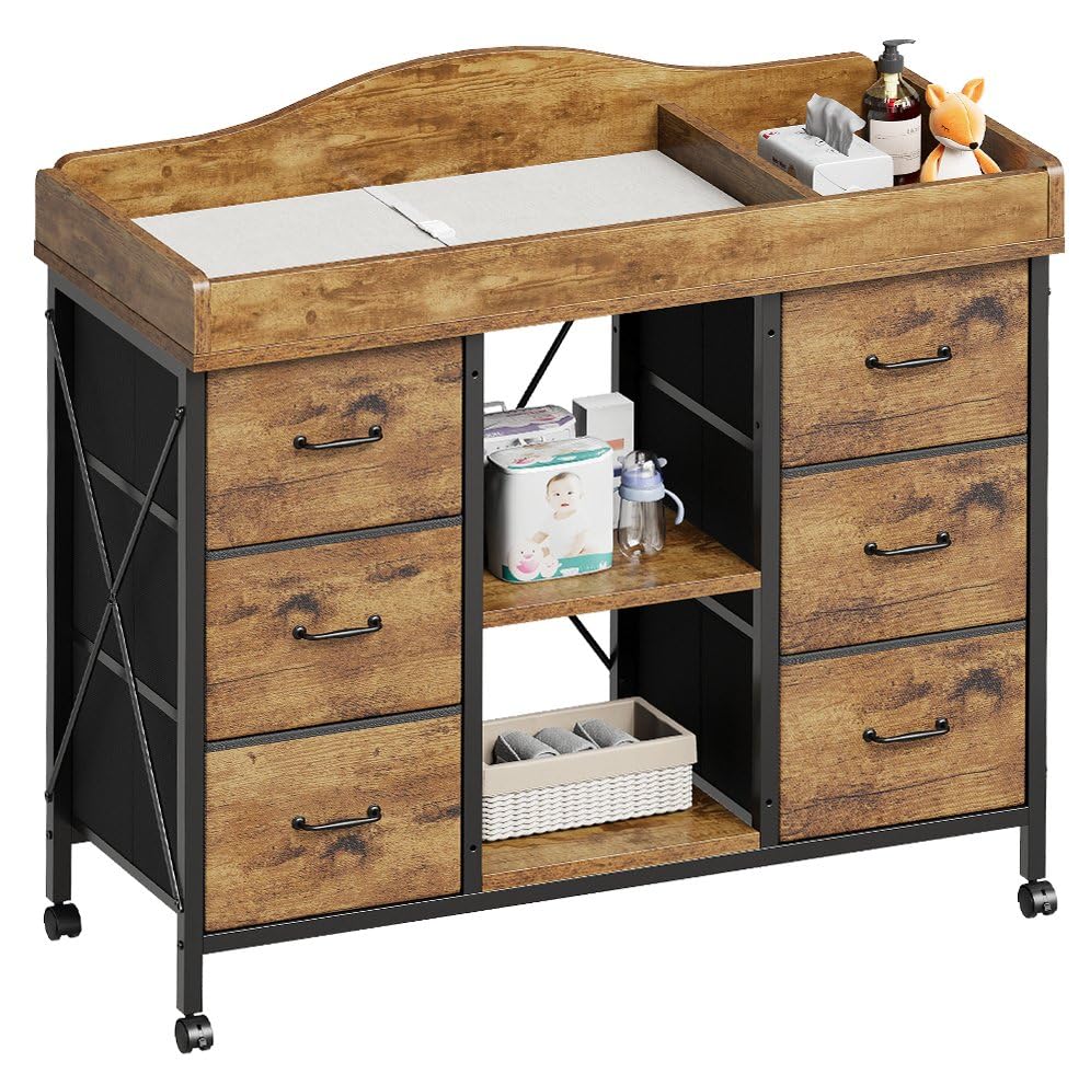 YeTom Yetom changing table top with 6-drawer dresser for organized baby care.
