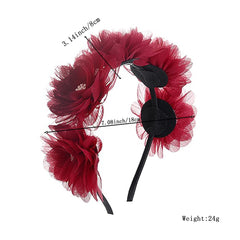 Close-up of Yheahin red flower headband petals and chiffon detail