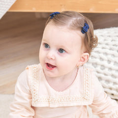 YHXX YLEN grosgrain bow closeup showing soft texture and durable clips for delicate hair