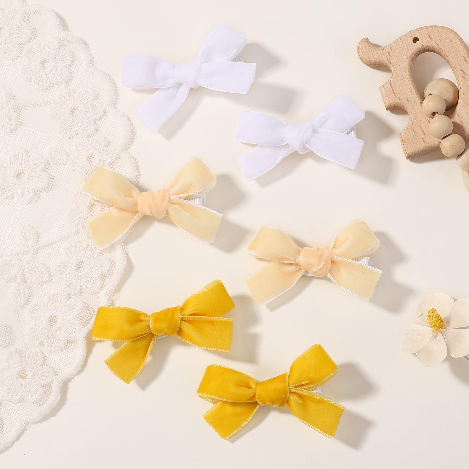 YHXX velvet hair bow navy coordinates with dark wardrobes and stays in place