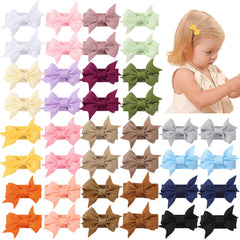 YHXX YLEN 1.4-inch mini bow snap clip for baby hair; lightweight and secure.