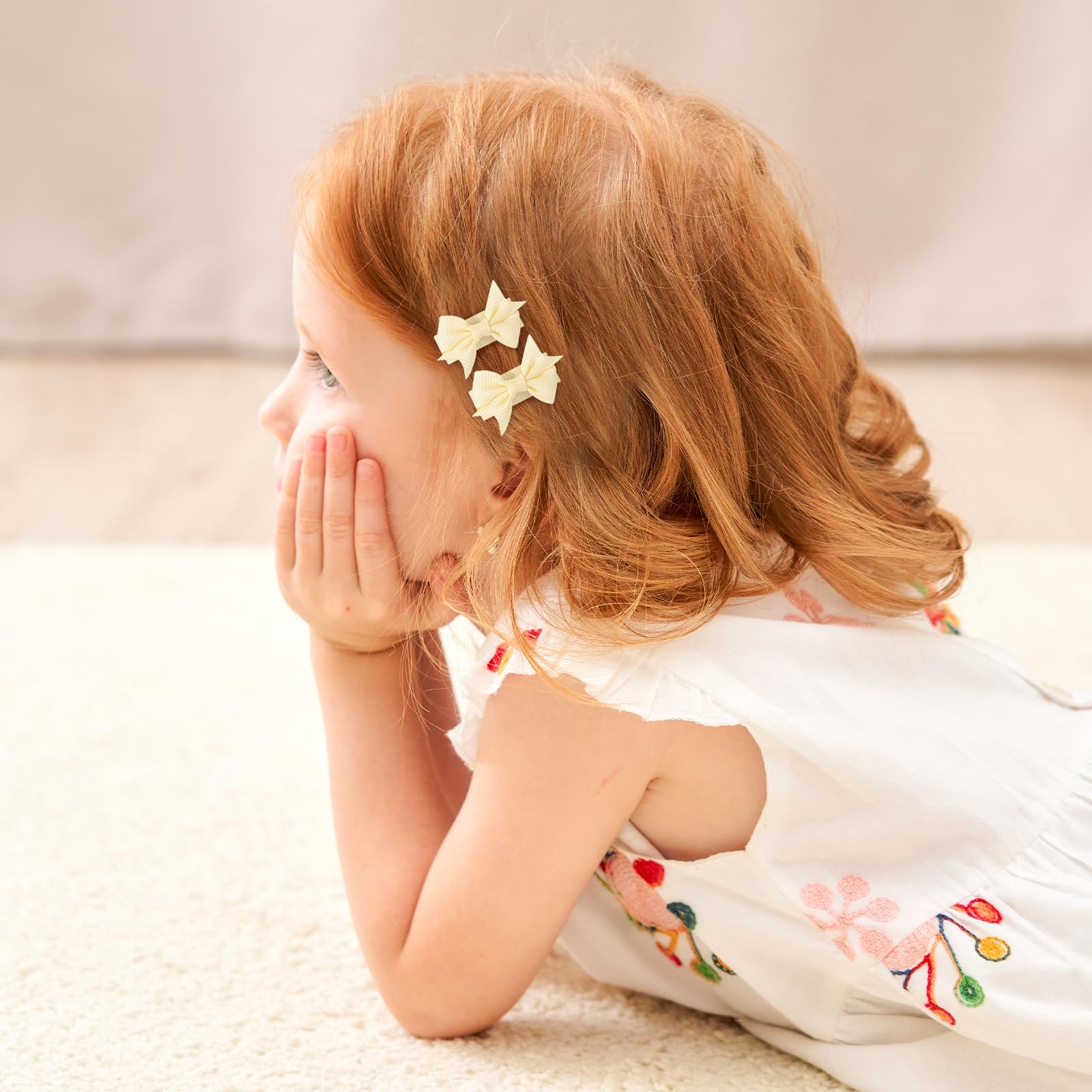 YHXX YLEN tiny grosgrain bow pair; versatile daily accessory.