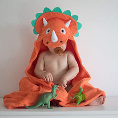 Yikes Twins hooded dino towel back view highlights dinosaur tail and playful design.