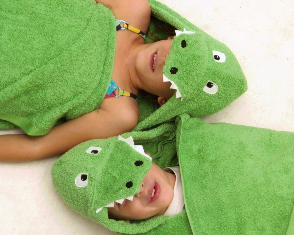 Green hood detail of Yikes Twins hooded towel enhances kid-friendly drying.