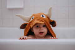 Yikes Twins hooded towel with horn detail for playful bath time