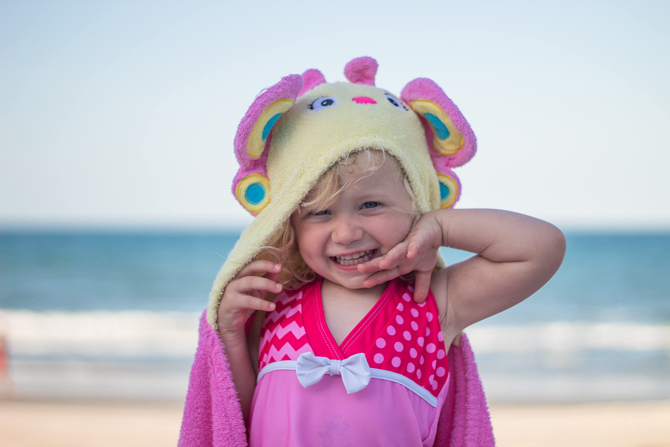 Yikes Twins hooded towel features pockets and robe-like closure.