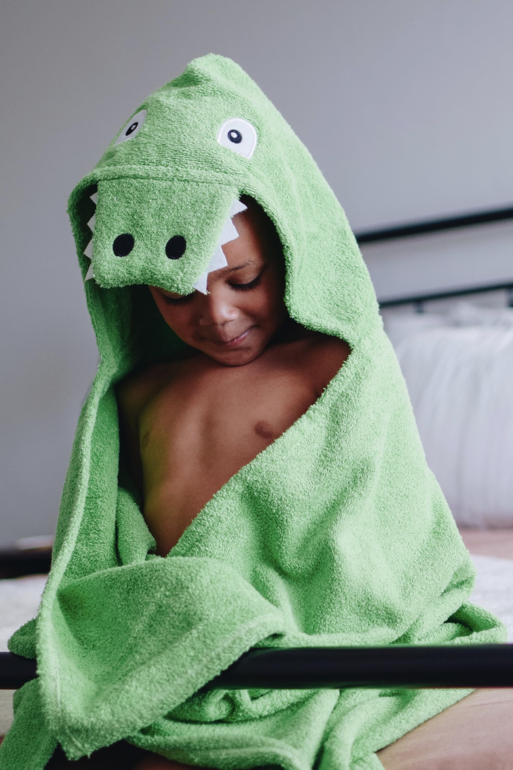 Soft cotton terry delivers a gentle, absorbent touch for bath time.