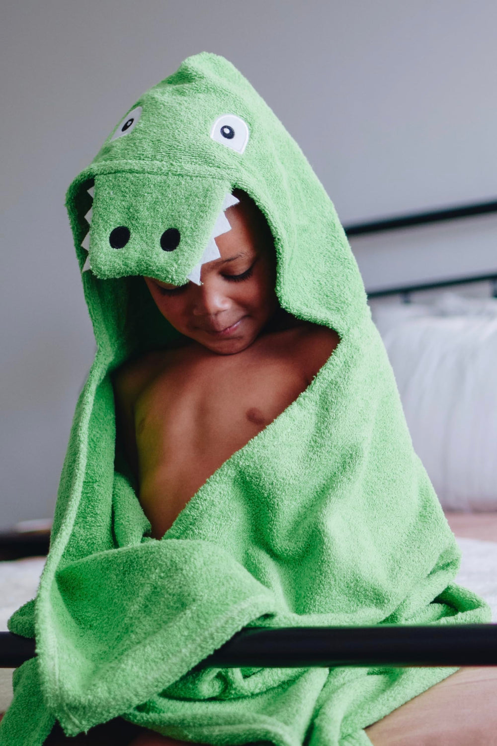 Soft cotton terry delivers a gentle, absorbent touch for bath time.