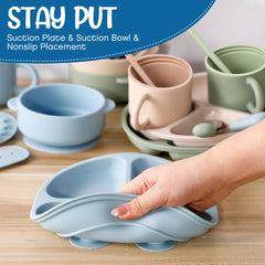 Yinder spoons and forks provide gentle contact for small hands learning to feed.