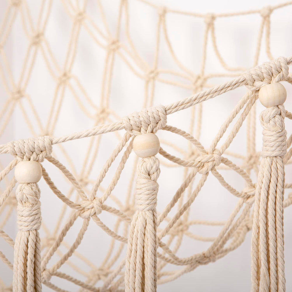 YKBU macrame toy organizer with tassels enhances nursery storage visually