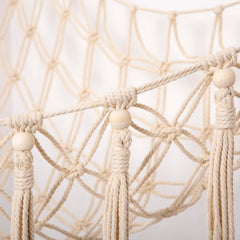 YKBU macrame toy organizer with tassels enhances nursery storage visually