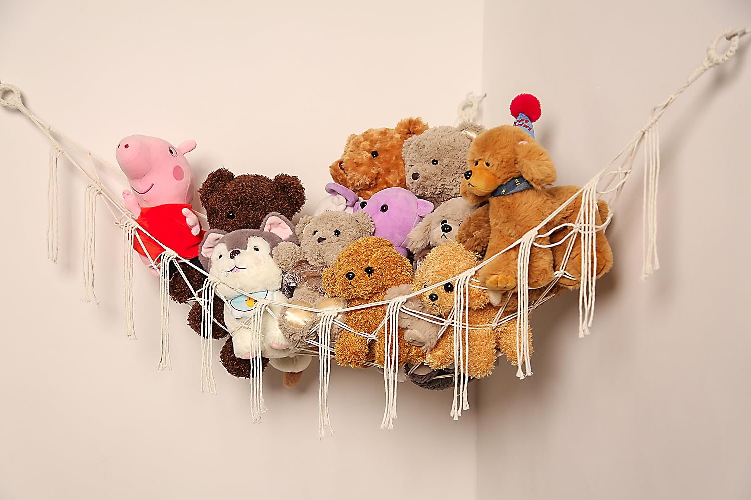 YKBU hanging net for stuffed animals keeps toys accessible.