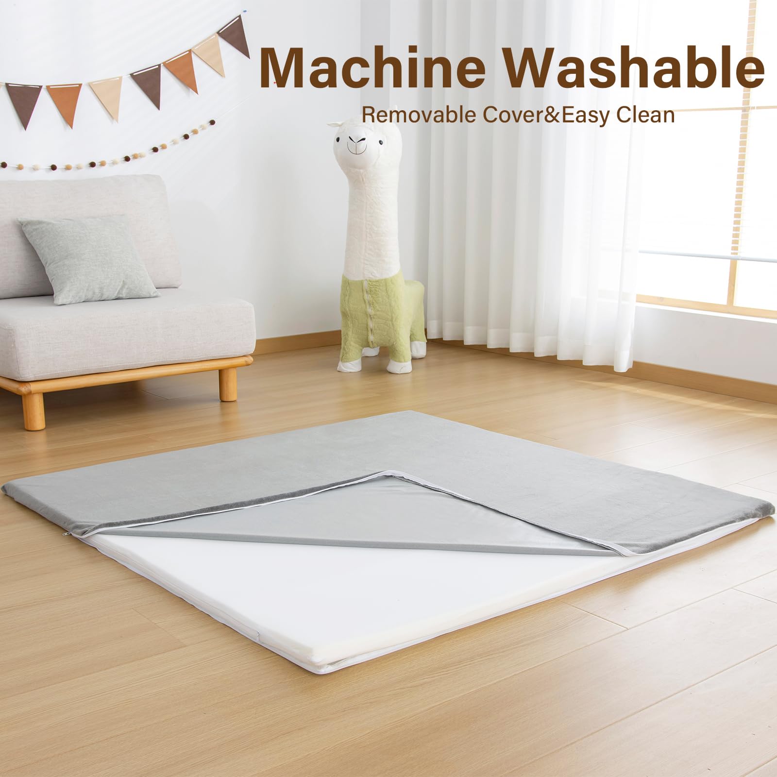 YKiMi Baby Play Mat's machine-washable cover simplifies quick tidy-ups.