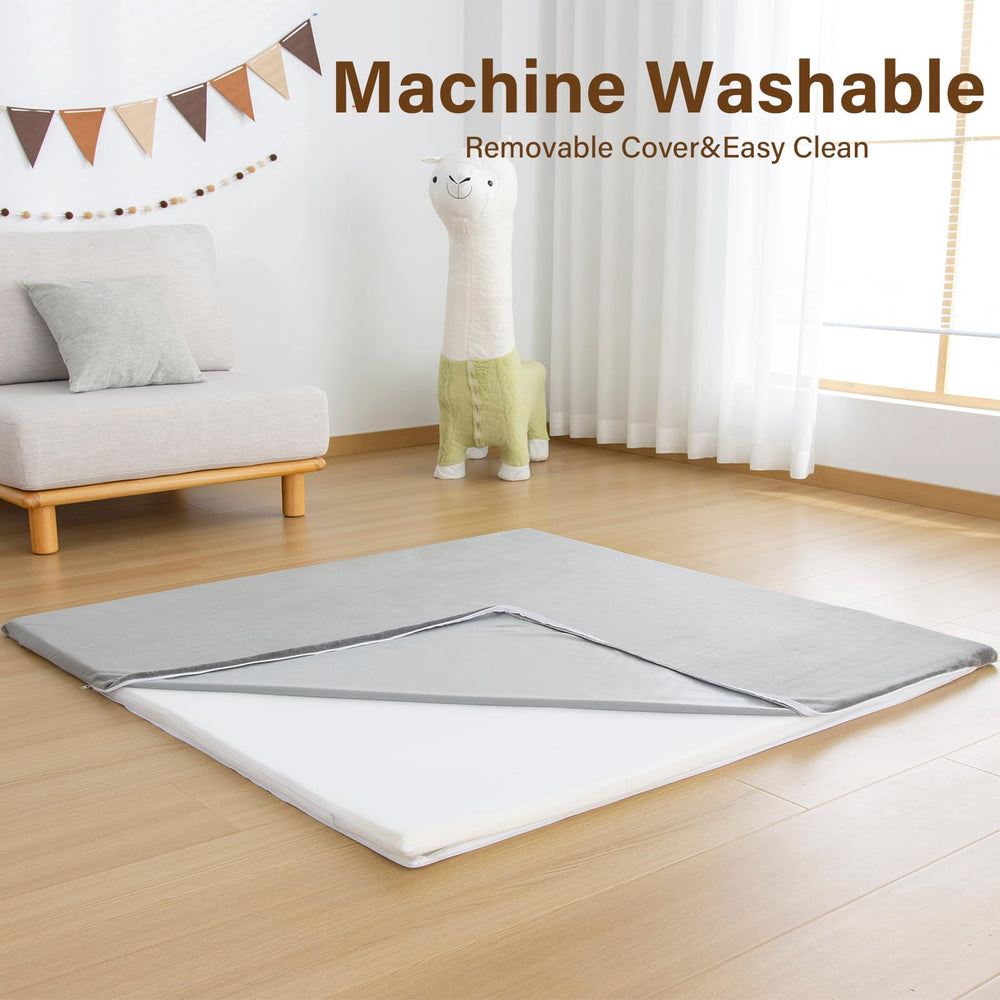 YKiMi Baby Play Mat's machine-washable cover simplifies quick tidy-ups.