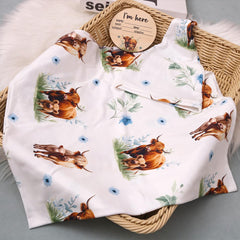 Ylsteed Highland Cow swaddle blanket blue folded edges neat presentation for gifting or storage