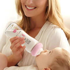 YOHKOH borosilicate glass baby bottle showing clear body for monitoring milk levels.
