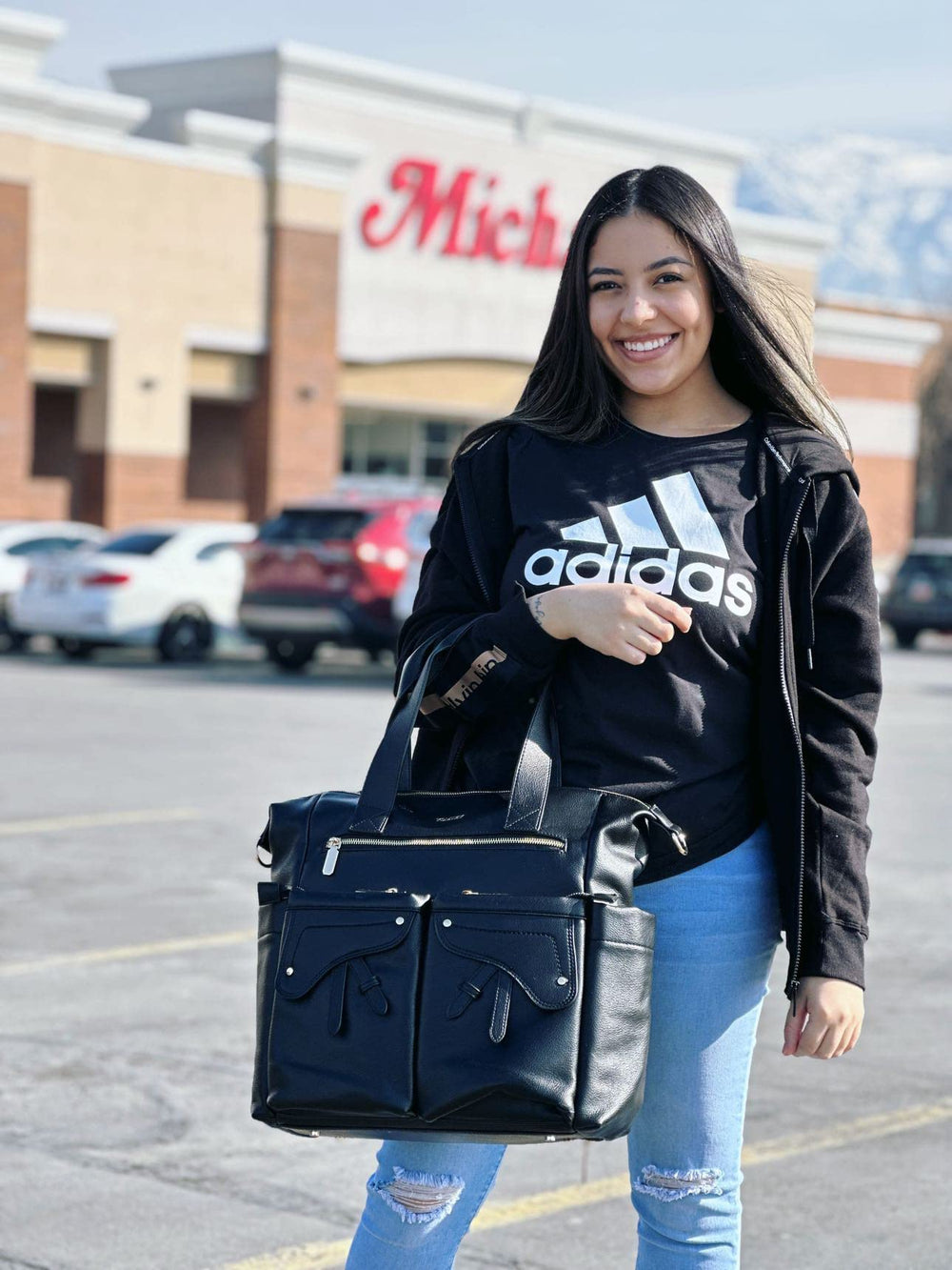 Yomiky leather diaper bag backpack made from waterproof materials for travel durability