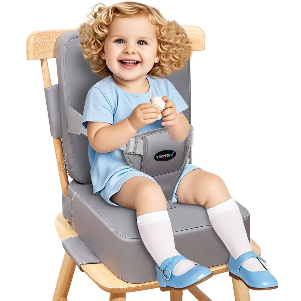 YONTINY toddler booster seat with removable backrest on a dining chair for stability.