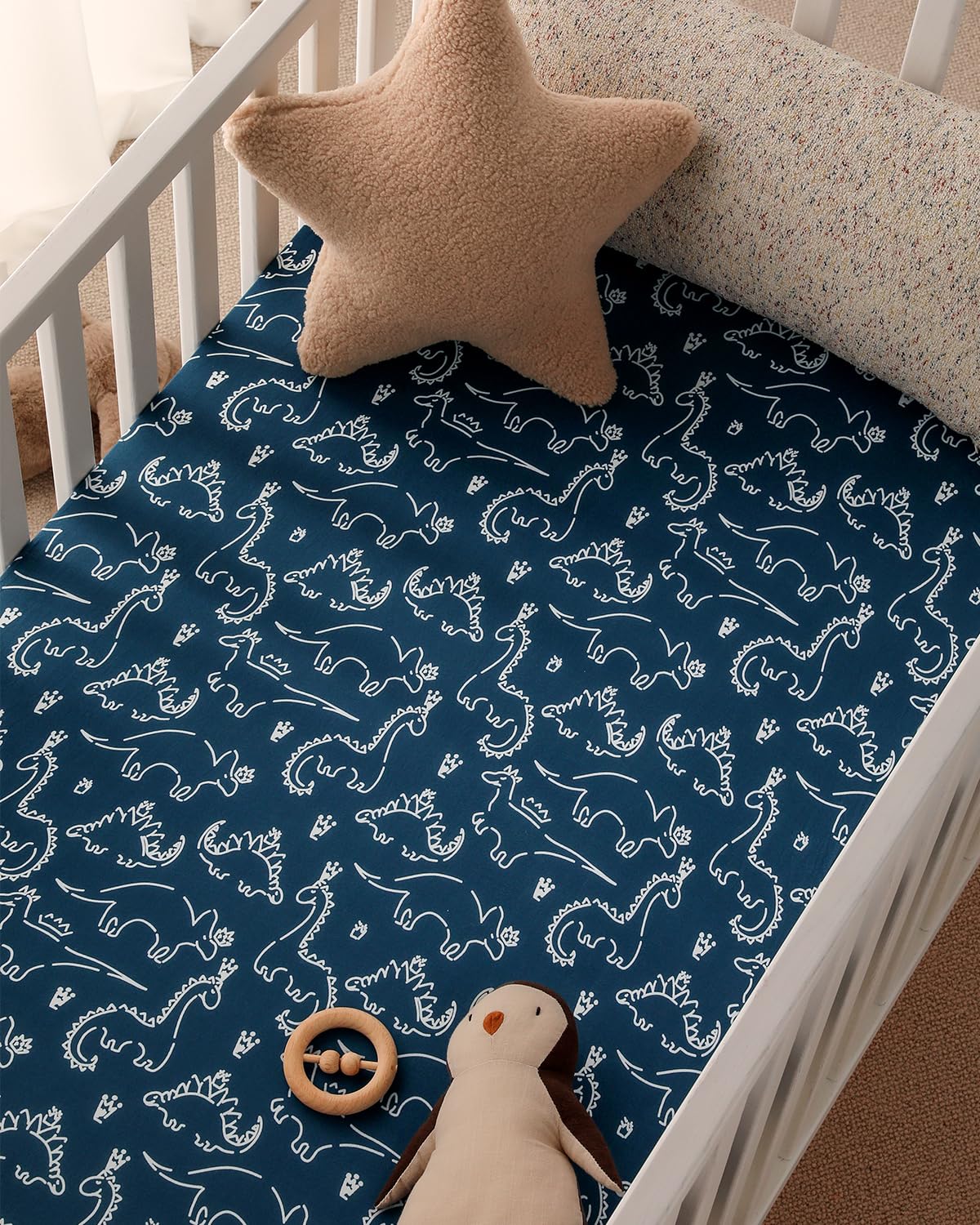 Yoofoss dark blue dinosaurs pattern brightens any nursery decor.