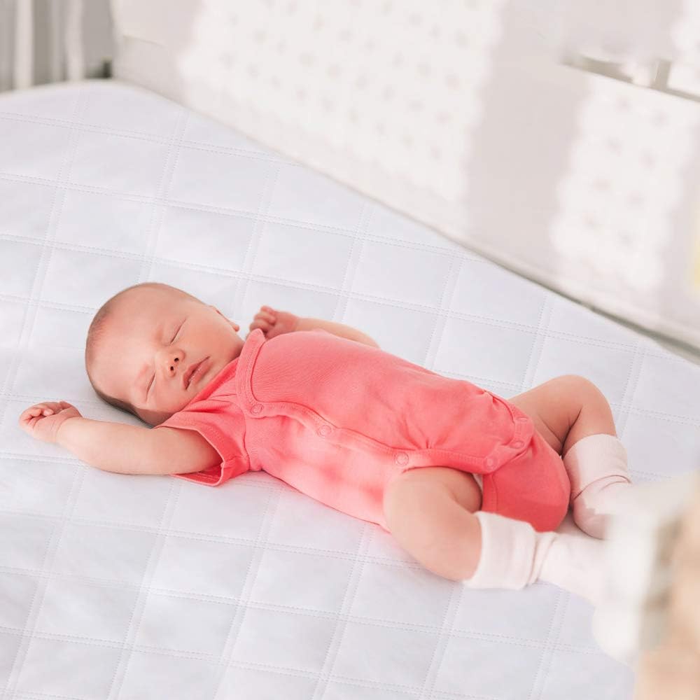 Yoofoss easy-clean bassinet pad in 34x19 for quick changes and care.