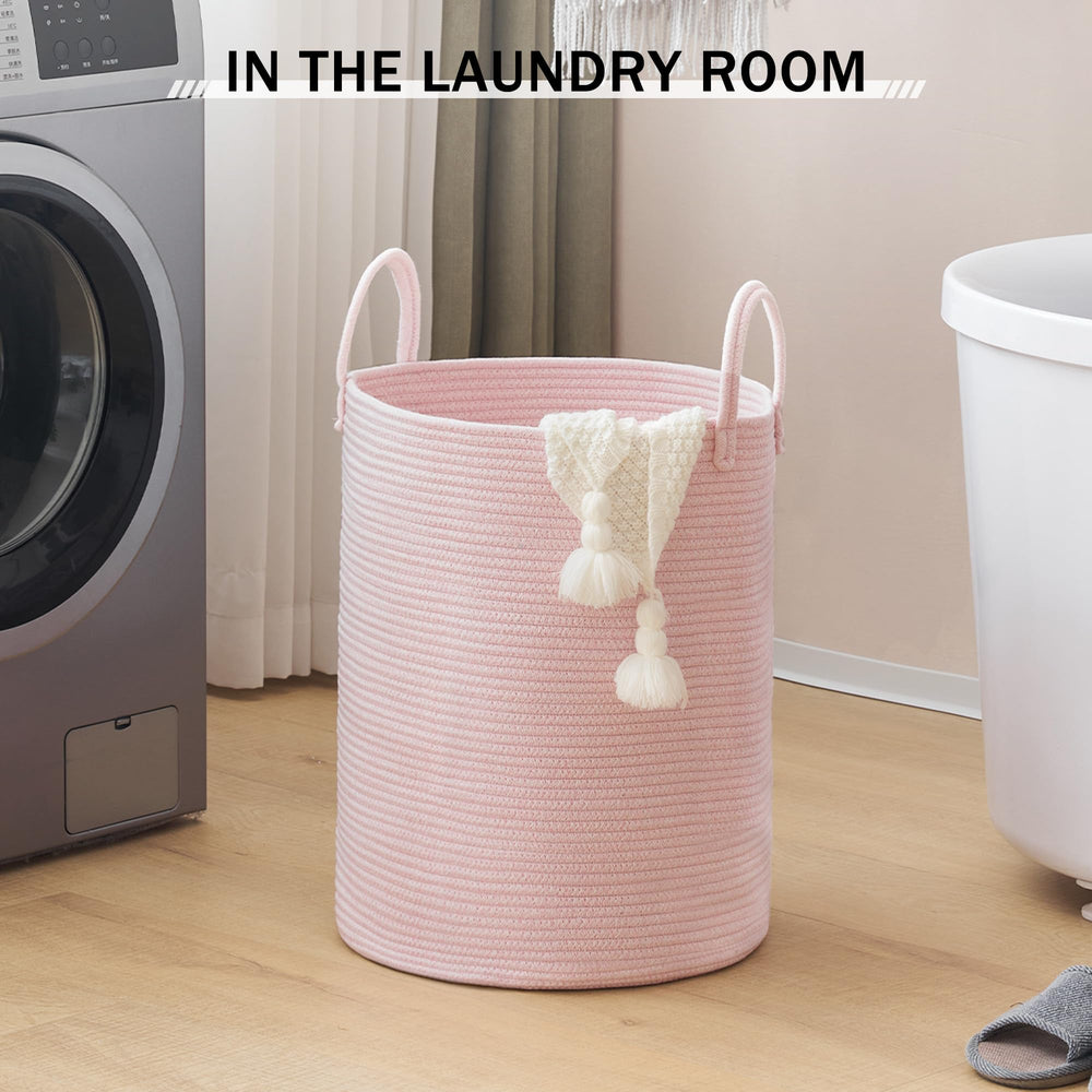 YOUDENOVA pink rope laundry bin adds a Nordic touch to room decor.