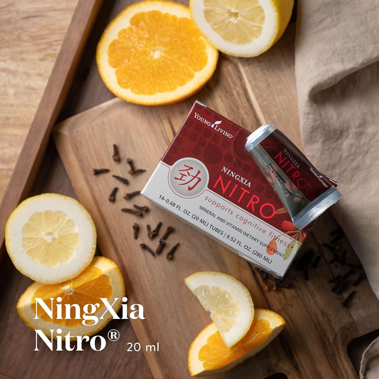 Young Living NingXia Nitro sachets closeup emphasizes wolfberry glow and compact design.