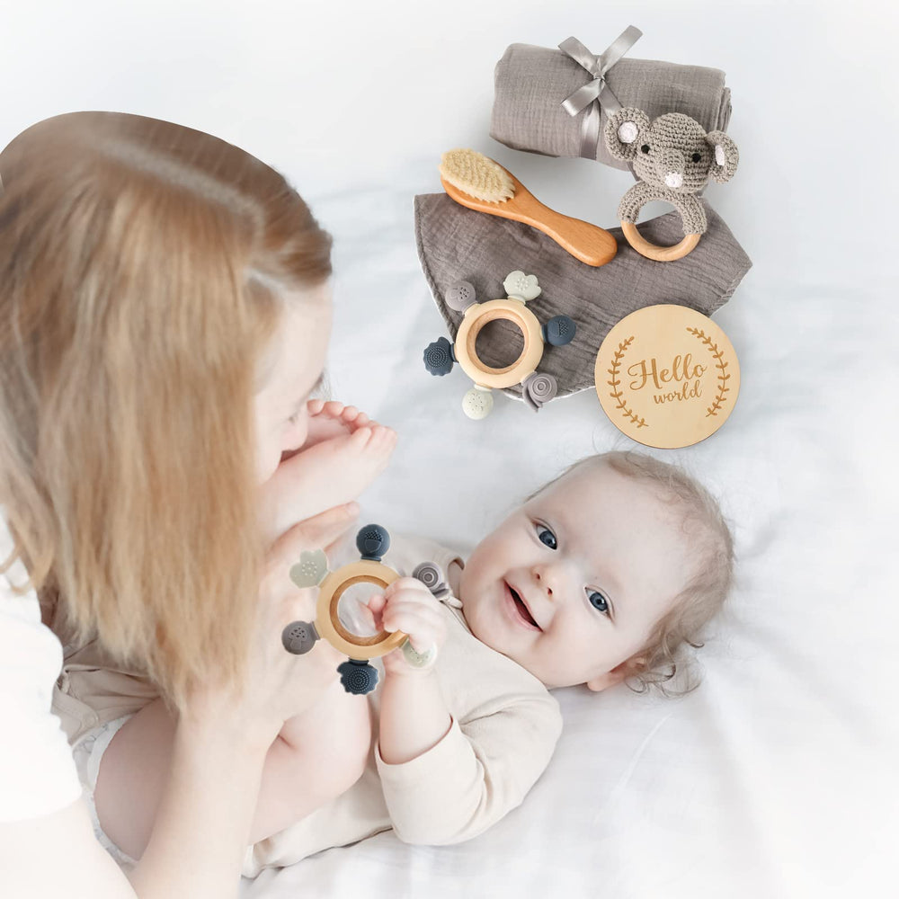 YOUUYS elephant rattle with bell, promotes sound awareness during play.