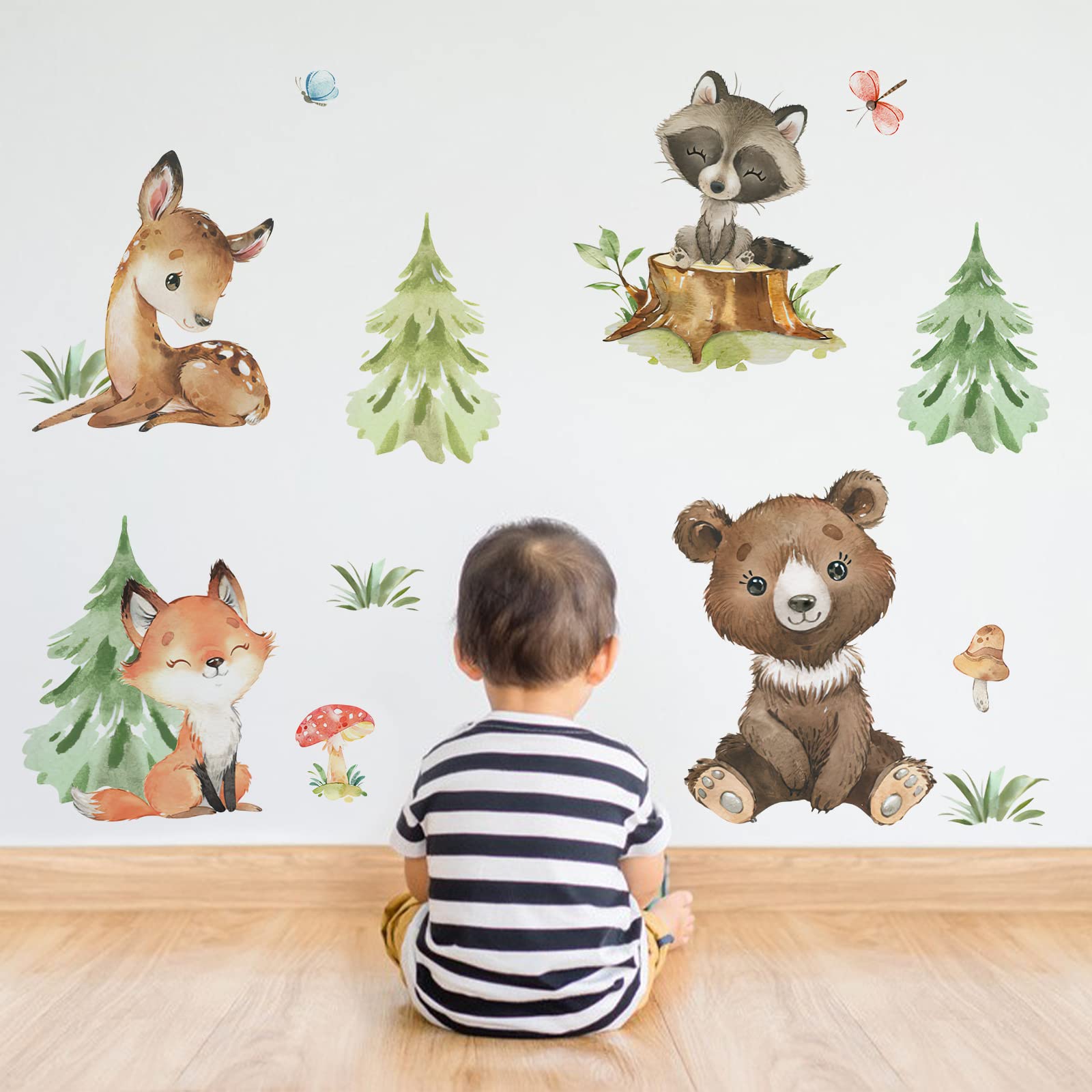 Yovkky pine tree wall decal creates a lush forest focal point in the room