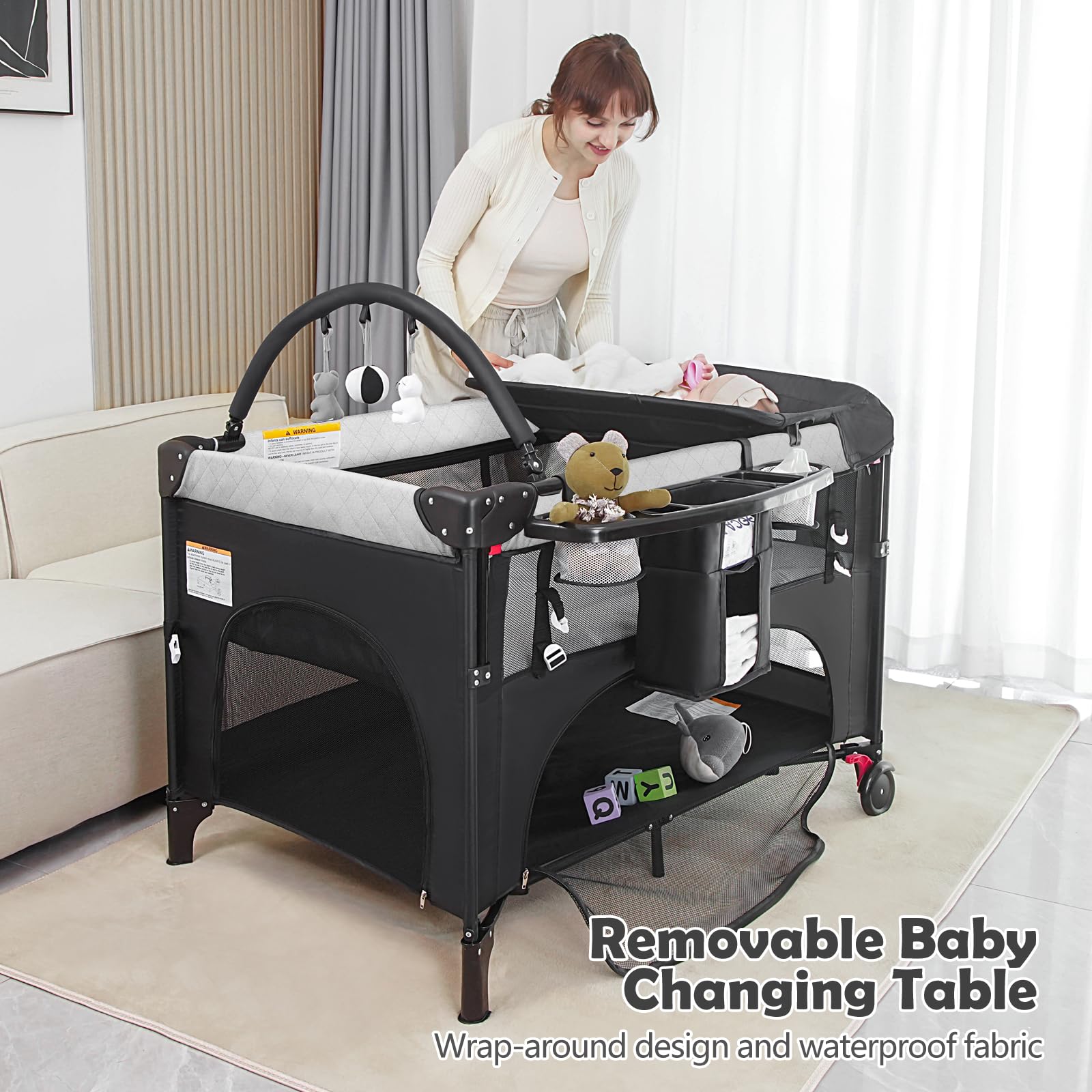 YoYiCuna foldable playard packs into a compact travel bag.