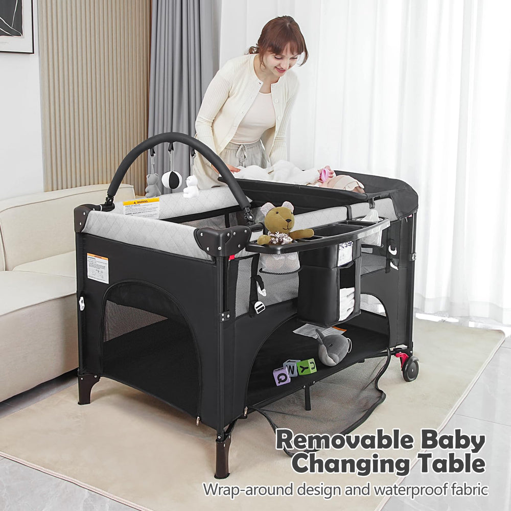 YoYiCuna foldable playard packs into a compact travel bag.