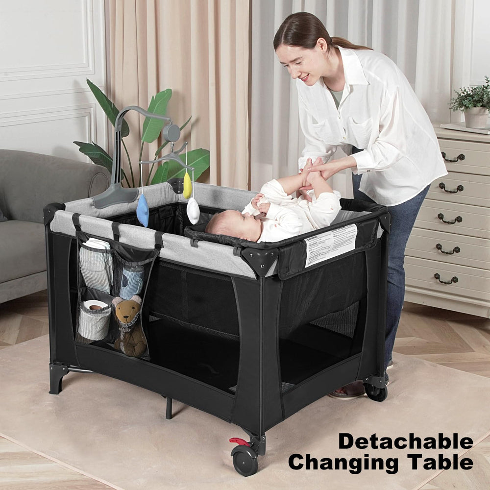 YoYiCuna travel crib folded in its carry bag showcases compact portability.