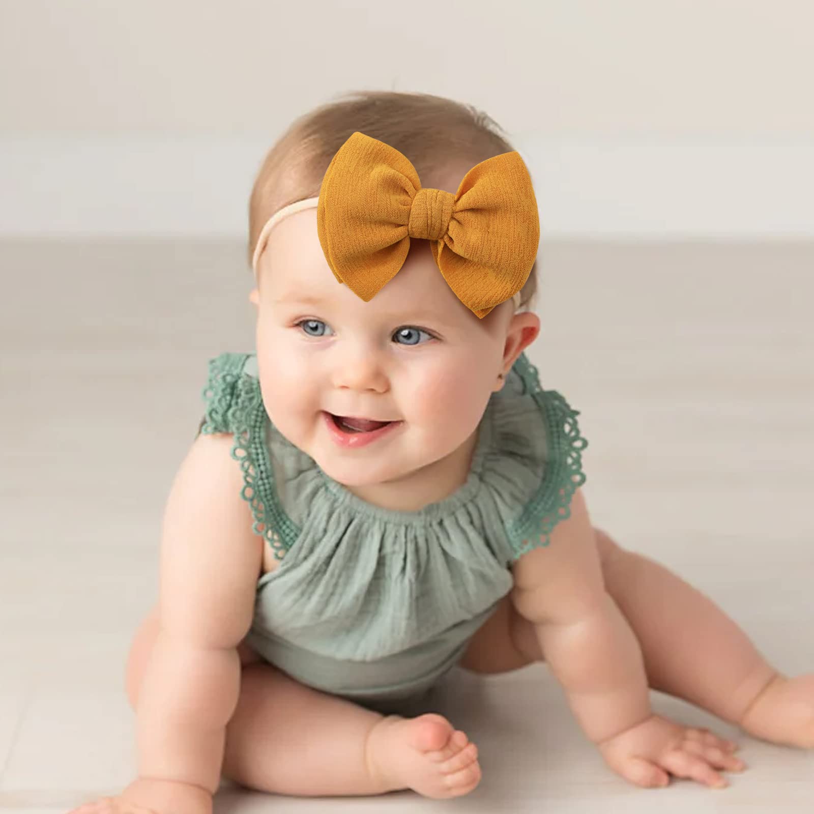 Yoyokid stretchy elastic headbands keep bows in place during playtime.