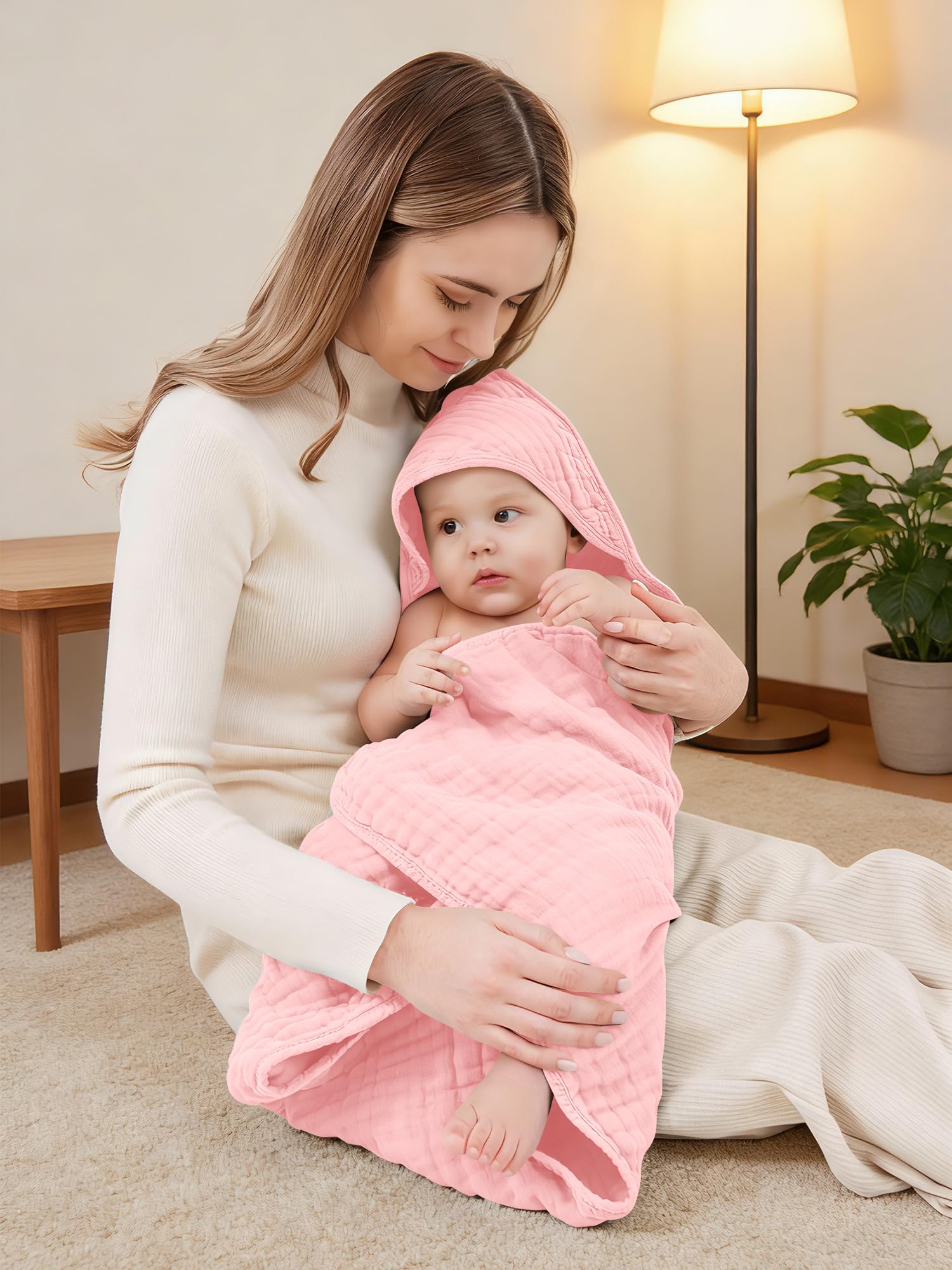 YOYOO pink hooded towel hero image, baby-safe, cozy wrap after baths.