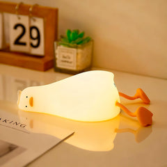 YR YRHH-PET duck lamp on bedside with warm glow
