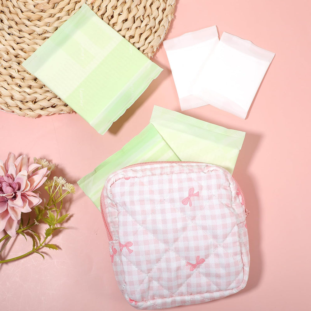 Yuanchu period bag pink spacious interior fits pads and tampons neatly.