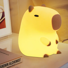 YuanDian Capybara Night Light demonstrates tap control for easy brightness adjustment.