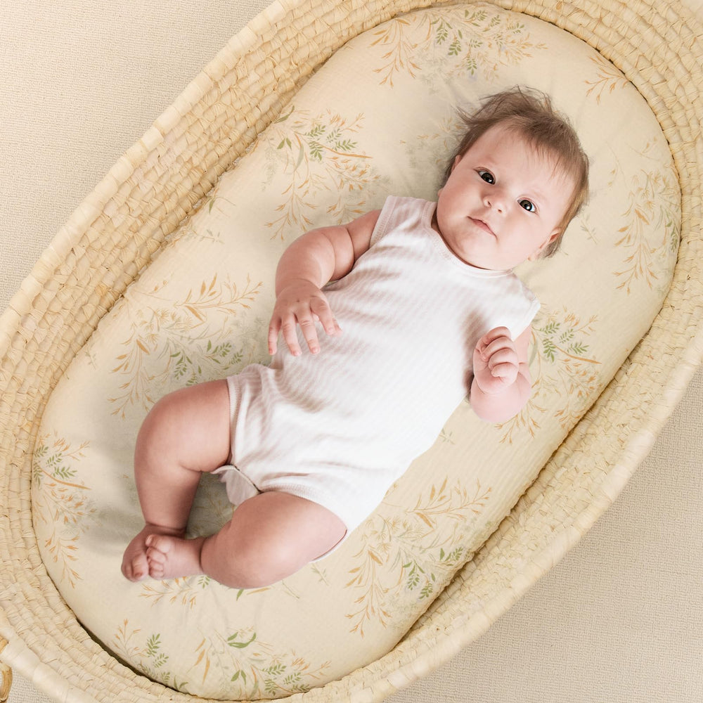 Yukkidds two-pack bassinet sheets in green patterns suit versatile nursery décor.
