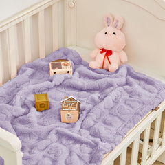 Yurhap blanket shown in stroller or car seat for on-the-go comfort.