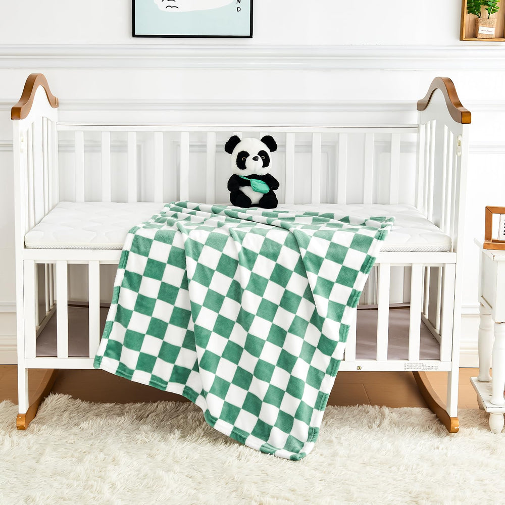 Yurhap checkered baby blanket travel view demonstrates lightweight design for car seats.