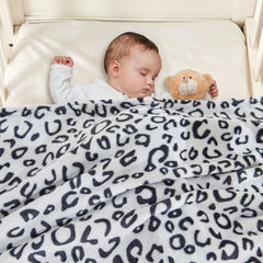 Yurhap grey leopard baby blanket showcased for crib use and easy care.