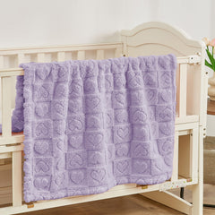Close-up of Yurhap plush fabric showing a soft touch for gentle baby comfort.