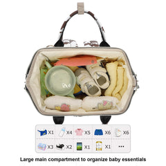 Yusudan cow print diaper bag with insulated bottle pockets keeping feeds warm.