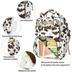 Yusudan cow print diaper bag interior organized compartments for bottles and wipes.